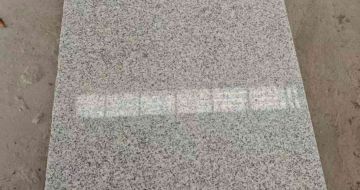 洛阳芝麻白光面毛板