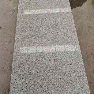 洛阳芝麻白光面毛板